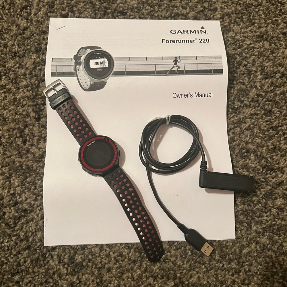 Garmin Forerunner 220 with charger and manual